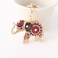 Gouden olifant sleutelhanger met kleurrijk emaille en sprankelende strass-steentjes - Rood