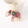 Porte-clés éléphant émaillé rose et doré avec cristaux colorés sur tasse en céramique - Rose