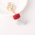 Christmas stocking keychain with red and silver rhinestones on a white ceramic plate - Christmas Stocking Red