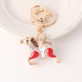 Portachiavi a forma di cavallo dorato con strass bianchi e dettagli in smalto rosso - Rosso