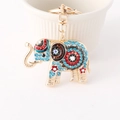 Porte-clés éléphant en alliage doré avec cristaux bleus et détails en émail - Bleu