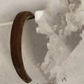 Detailed texture of thick brown velvet headband with vintage high-crown French design - Khaki