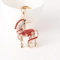 Goldener Einhorn-Schlüsselanhänger mit roten und weißen Strasssteinen als Geschenk - Rot