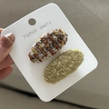 Detail of tweed and olive green plush hair clips on a white display card - Green Plush Red Stripe (5218440096597)