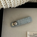 Macro detail of baby blue tweed hair clip with pearl bead and gold 'White' charm - Blue Square (4#)