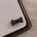 Elegante fermaglio per capelli a fiocco in acetato trasparente con logo oro rosso e nero - Nero