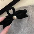 Elegant black flocked hair claw clip with bow design and a large pearl accent - Bowknot Flocking with Gray Pearl