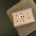 Detail view of the pink cookie-shaped resin hair claw clip with a cute cartoon smile - Pink Square Cheese Hair Claw (2#)