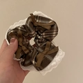 Plaid hair scrunchie with white lace trim and brown satin bows held in hand - Coffee Plaid Scrunchie With White Lace