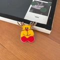 Cute embroidered cartoon reindeer hair clip in vibrant yellow and red on dark wood surface - Elk BB Clip (38#)