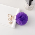 Portachiavi con pompon di pelliccia sintetica viola, angelo di cristallo e cuore oro - Viola