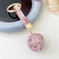Sparkling pink rhinestone ball keychain with gold ring and pink leather strap - Pink White