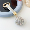Sparkling crystal ball keychain with rainbow rhinestones and golden ring on a white band - AB White
