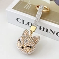 Chic fox keychain with white pearls and sparkling rhinestones on golden metal ring - White