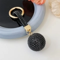 Fashionable luxury keychain with a full black rhinestone sphere and gold-toned metal ring - Black