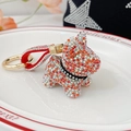 Bulldog keychain with white and orange rhinestones and a red leather strap pendant - Red White