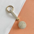 Sparkling crystal ball keychain with a white rhinestone wristlet and golden metal ring - White