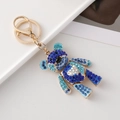 Blauer Strass-Bär-Schlüsselanhänger mit goldenem Metallrahmen und Karabinerverschluss - Blau-Serie
