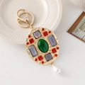 Exquisiter Vintage-Gold-Schlüsselanhänger mit grünem Edelstein und Perlenanhänger - Vintage Oval Edelstein Perle (6204) / Mattgold Stil