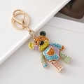 Farbenfroher Teddybär-Schlüsselanhänger mit Strasssteinen und goldenem Metallring - Gelbe Serie