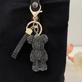 Creative black rhinestone bear keychain pendant with gold clasp and matching wrist strap - Black