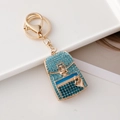 Blue rhinestone backpack keychain with gold heart pendant and secure metal ring - Blue