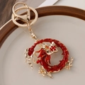 Vintage Chinese zodiac dragon keychain with golden metal texture and red enamel detailing - Retro Copper