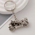 Polished silver zinc alloy motorcycle keychain with a detailed racing bike design - Bright Silver
