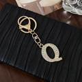 Sparkling gold-tone initial Q keychain with clear crystals and secure lobster clasp - Letter Q
