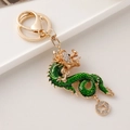 Portachiavi drago dorato con smalto verde e strass brillanti per lo zodiaco cinese - Verde
