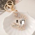Portachiavi a granchio 3D in metallo dorato con grande cristallo e strass lucidi - Bianco