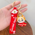 Cartoon Chinese dragon keychain with red wristband and gold ring for car keys - Peace and Safety