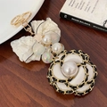 Elegant beige bow keychain with camellia flower and pearls for handbags - White