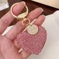 Glinsterende roze strass hartvormige sleutelhanger met gouden sluiting en hanger - Roze