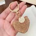 Glinsterende champagne goud hart sleutelhanger met strass en ronde veer sluiting - Champagne