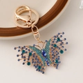 Vintage gold-plated butterfly keychain with blue rhinestones for bags and car keys - Blue