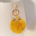 Portachiavi danza del leone con pompon giallo e ciondolo dorato con strass brillanti - Giallo