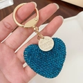 Sparkling blue rhinestone heart-shaped keychain with gold metal hardware and logo tag - Blue