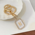 Goldener Buchstaben N Schlüsselanhänger mit Strass auf elegantem rechteckigem Anhänger - Buchstabe N