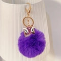 Porte-clés à pompon violet exquis avec breloque de danse du lion en strass étincelants - Violet