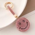 Portachiavi con faccina sorridente in strass rosa e chiusura dorata per borse - Rosa