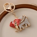 Portachiavi a elefante dorato con strass bianchi lucidi e motivi in smalto rosso - Rosso