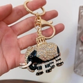 Portachiavi a forma di elefante dorato con smalto nero e strass colorati per borse e auto - Nero