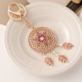 Porte-clés attrape-rêves en alliage doré orné de strass violets et roses brillants - Flocon de Neige Rose