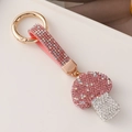 Portachiavi a fungo rosa con strass di cristallo su cinturino in metallo oro - Rosa