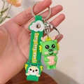Cute green cartoon dragon keychain with silicone strap and lucky figurine charm - Dinosaur Green