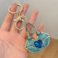 Blue crystal handbag keychain with heart-shaped gemstone and gold metal ring - Blue