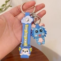 Sky blue cartoon dragon keychain with silicone strap and durable metal lobster clasp - Dinosaur Blue