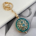 Kreativer Schildkröten-Schlüsselanhänger mit blauem Katzenauge und Kristallen in Gold - Blau