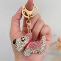 Portachiavi a forma di cane con strass rosa e bianchi e chiusura in metallo dorato - Rosa